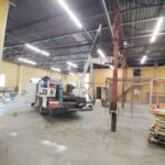 Interior structural steel column reinforcement and welding work inside a commercial industrial facility in Pennsylvania.