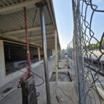 Structural steel support column installed during a commercial storefront renovation and building reinforcement project in Pennsylvania.