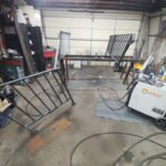 Custom fabricated steel railings and guardrails prepared for welding and installation in a Pennsylvania metal fabrication shop.