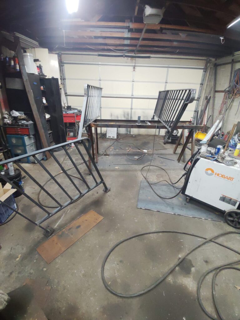 Custom fabricated steel railings and guardrails prepared for welding and installation in a Pennsylvania metal fabrication shop.