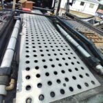 Custom fabricated perforated steel deck panel installed on a heavy duty truck platform in Pennsylvania.