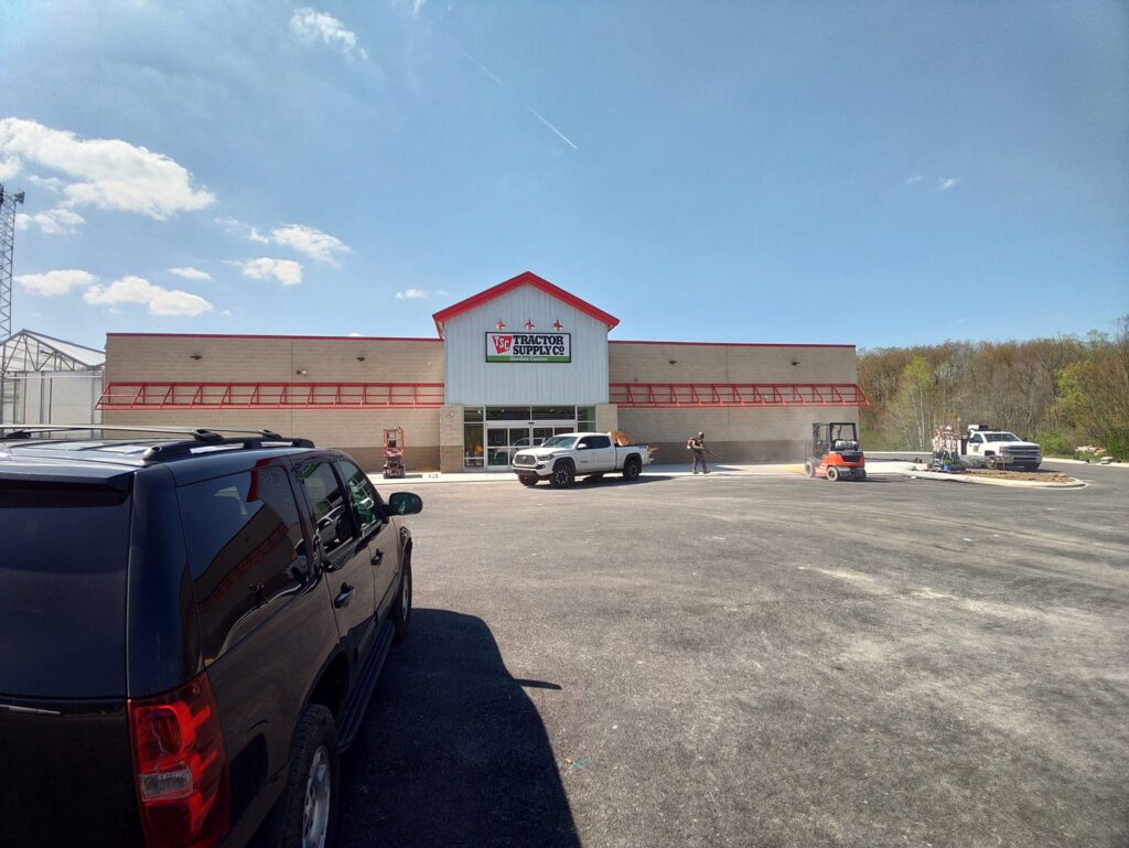 Commercial building steel structure and awning framework installation at Tractor Supply store in Pennsylvania