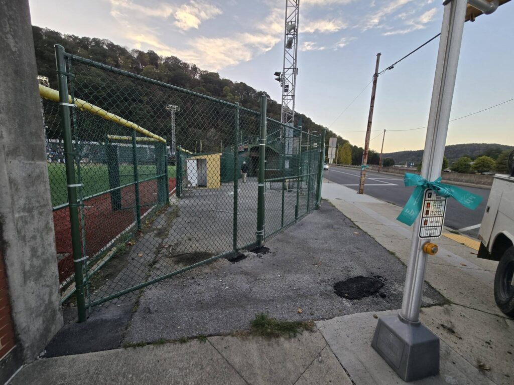 Commercial chain link fence installed around sports facility