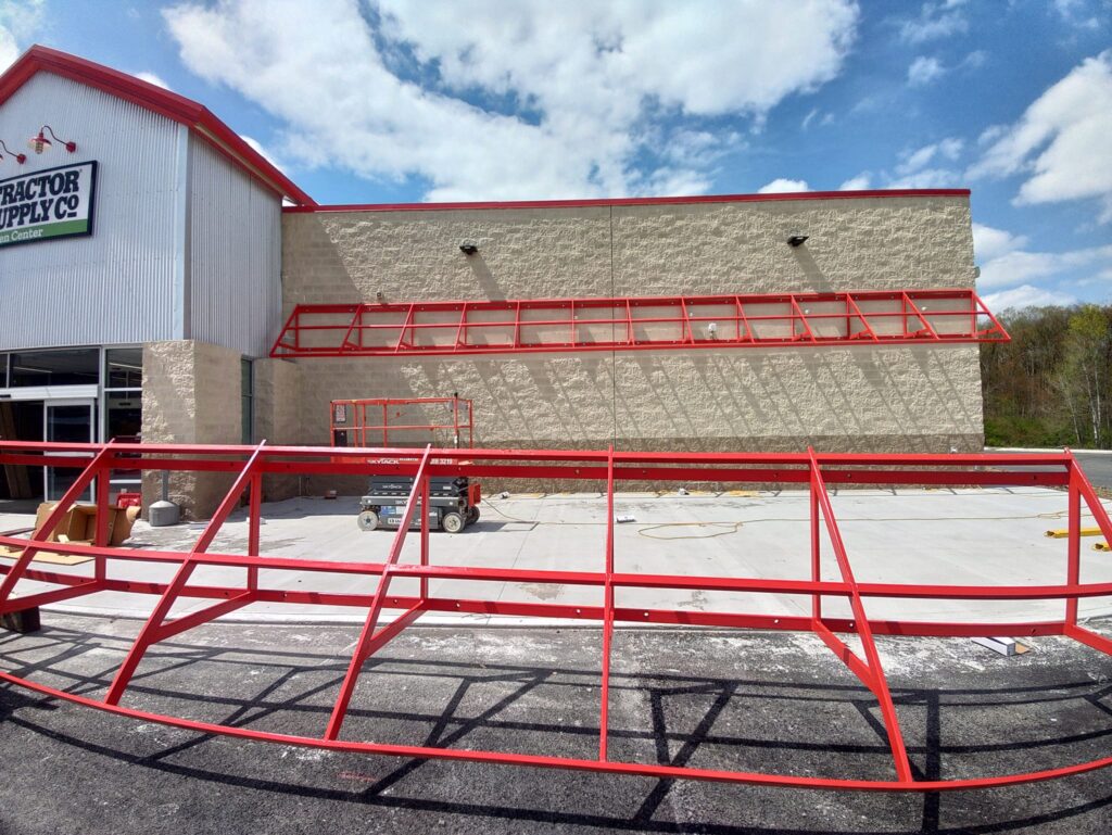 Commercial steel railing system fabricated and installed outside Tractor Supply store in Pennsylvania