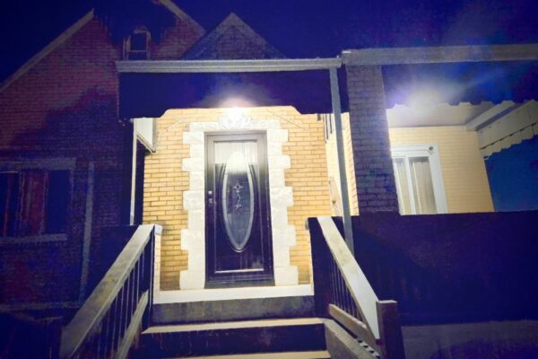 Custom steel handrails installed on residential front steps