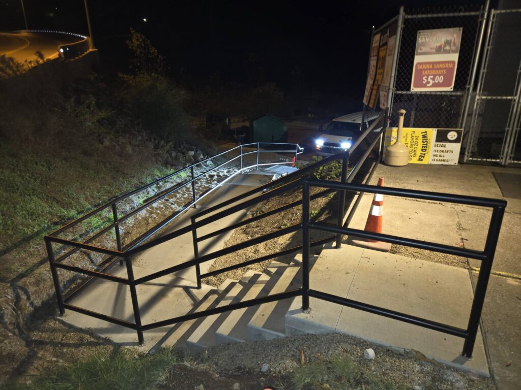 Custom steel ADA ramp handrail installation at commercial property in Pennsylvania