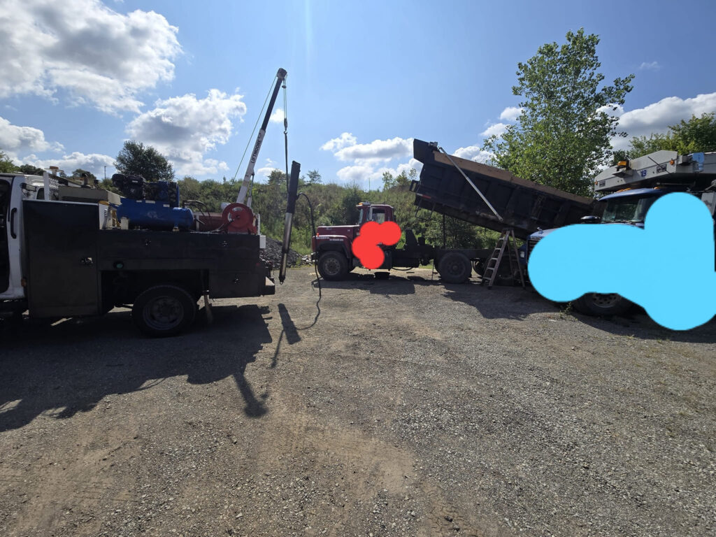 Mobile welding service repairing heavy dump truck equipment on site