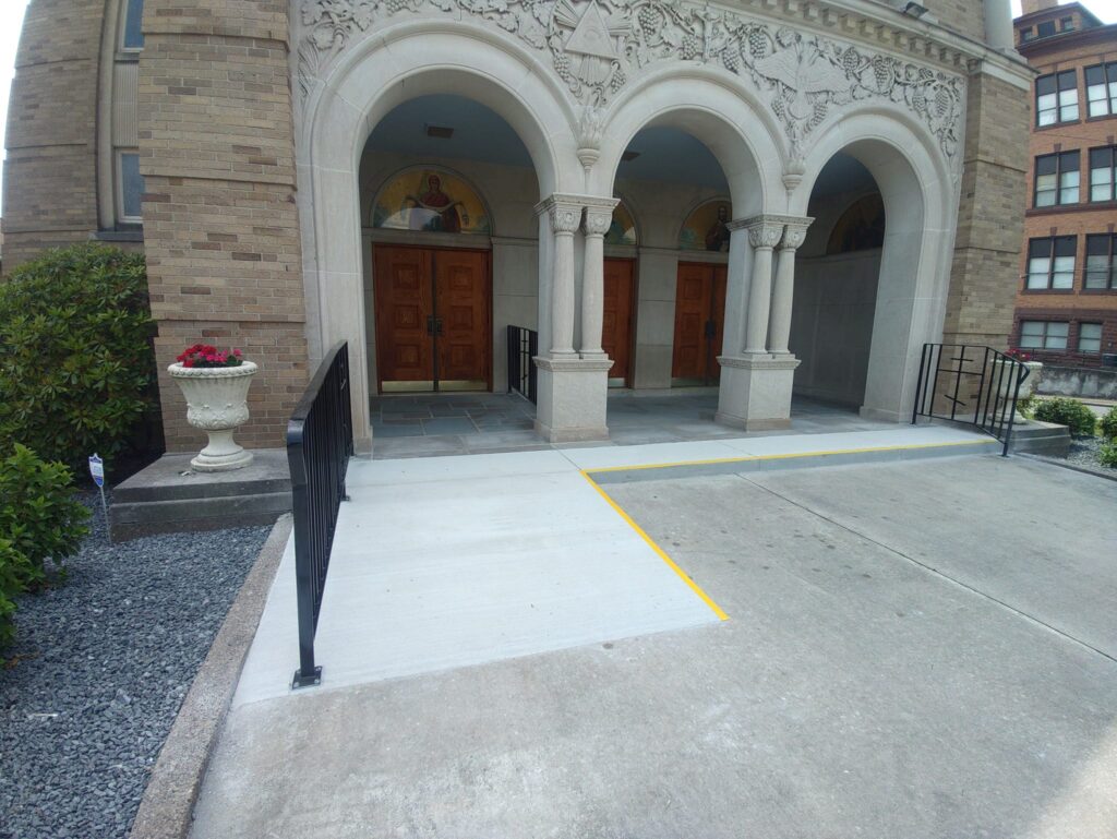 Custom steel railing installed at historic building entrance