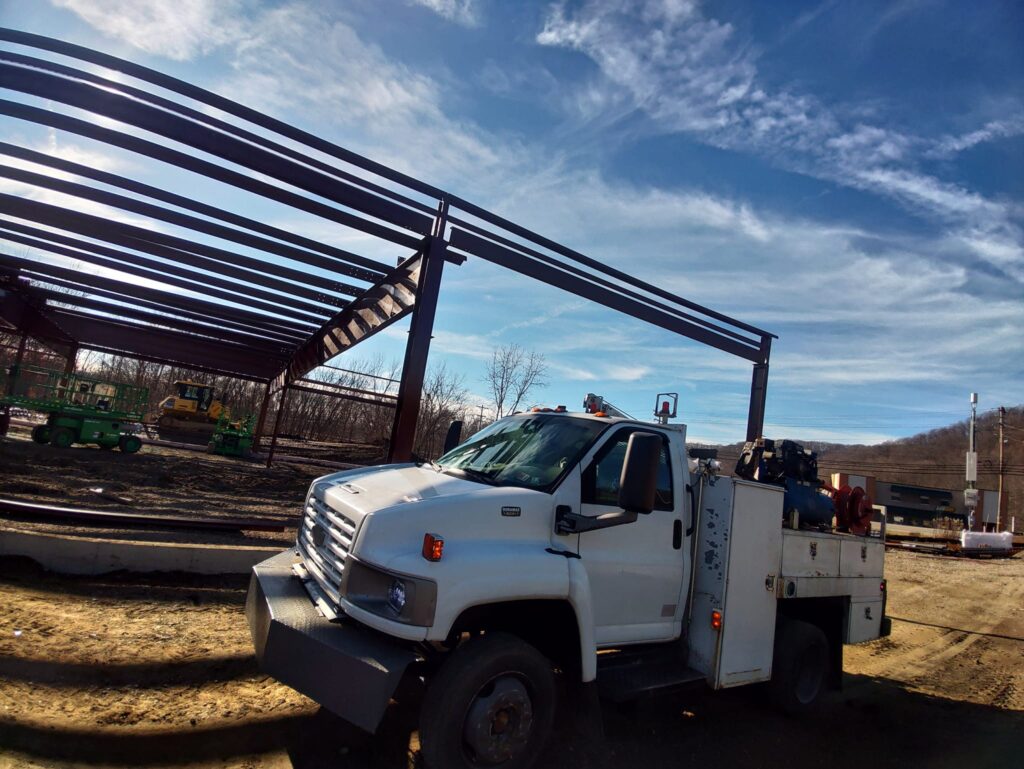 Structural steel frame construction for industrial building project