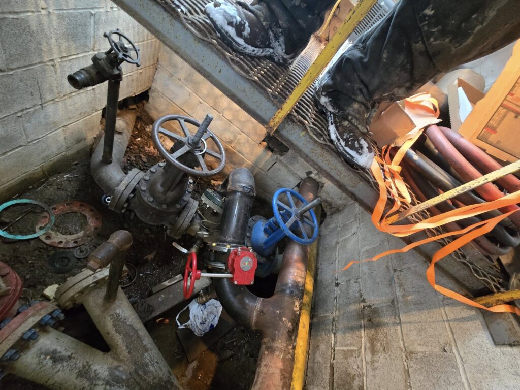Industrial pipe valve system repair performed with mobile welding service