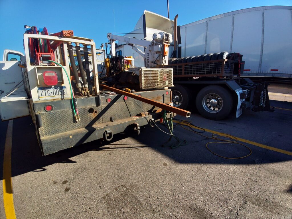 Mobile welding truck performing on site commercial steel repair