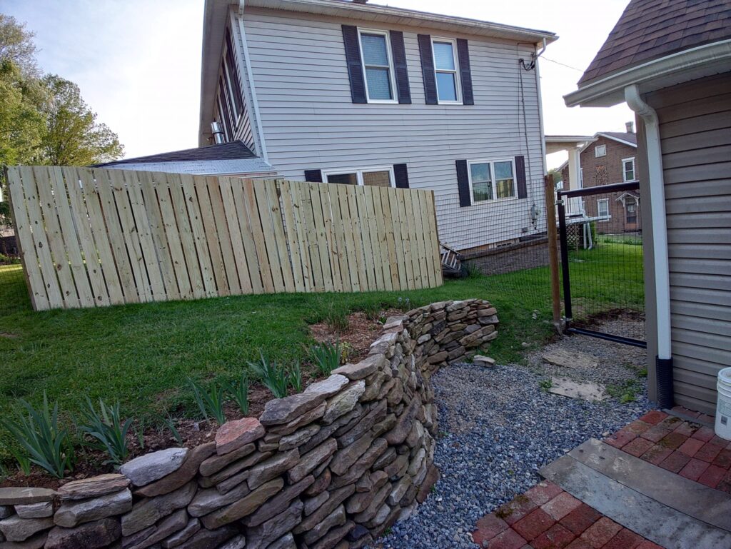 Custom residential steel fence and gate installation