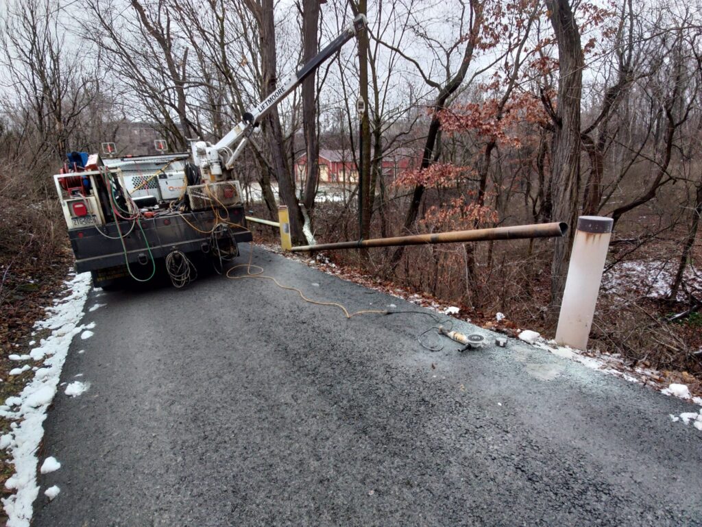 Mobile welding truck installing roadside steel barrier pipe in Pennsylvania