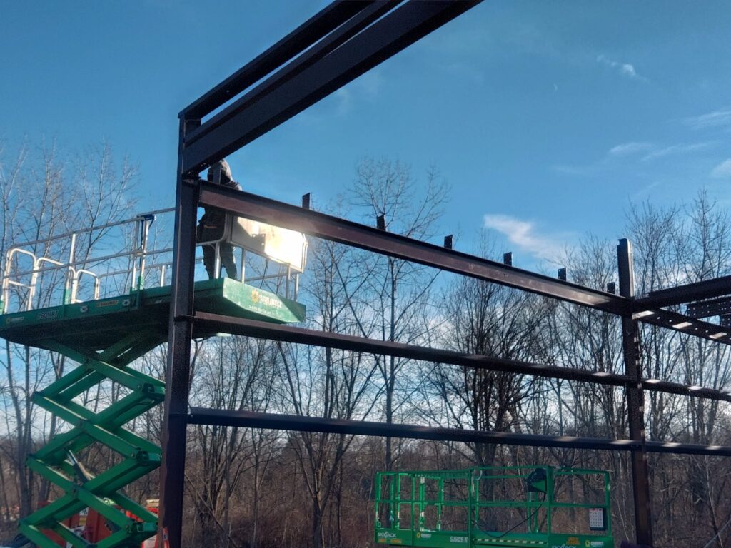 Structural steel frame installation using lift equipment in Pennsylvania