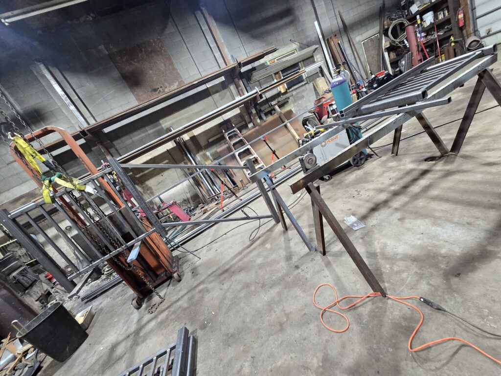 Structural steel frame fabrication and welding inside metal fabrication shop in Pennsylvania